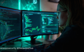A cybersecurity researcher analyzing WhatsApp security logs on multiple monitors, showing Meta’s expanded WhatsApp security research efforts.